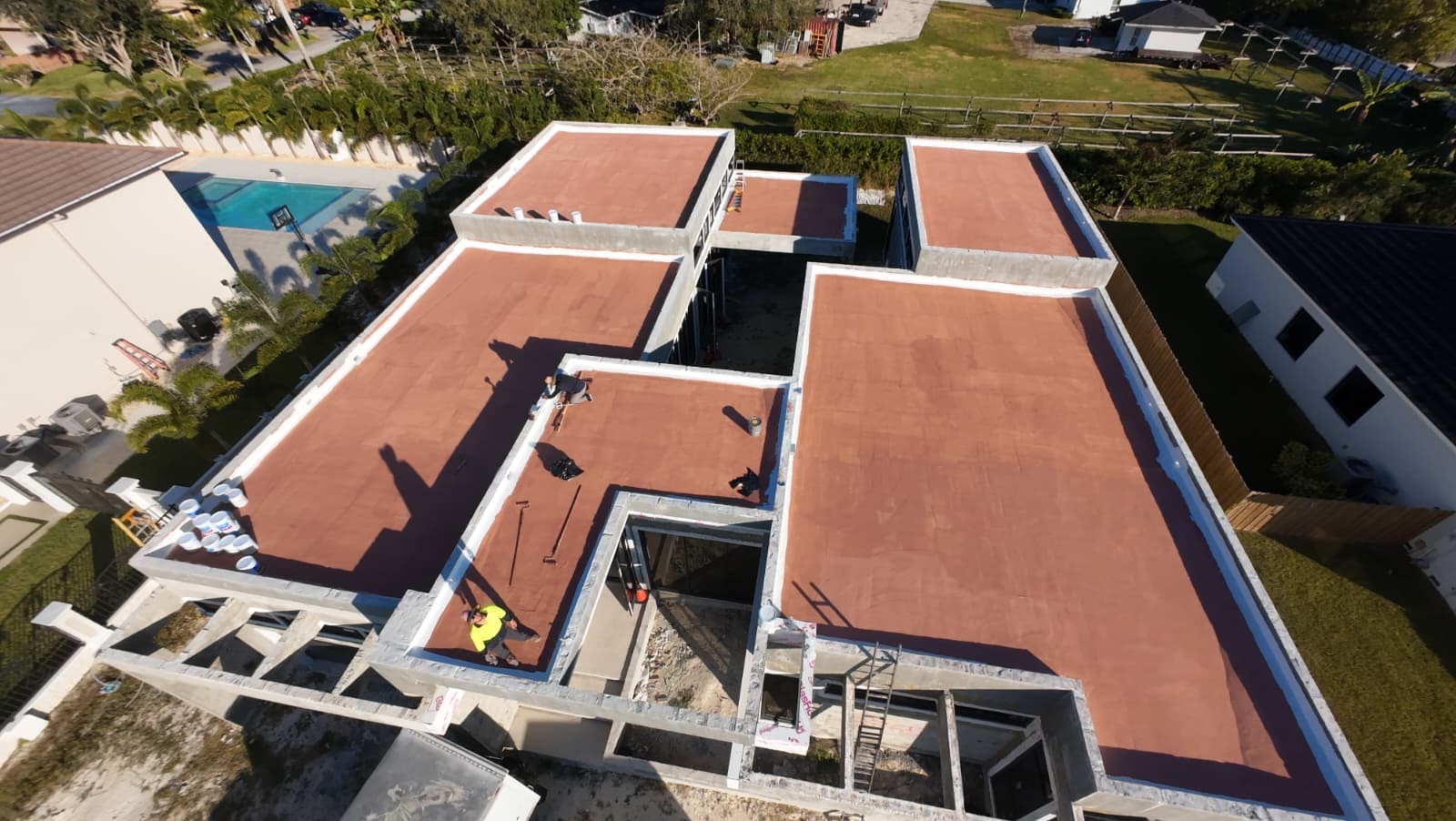 Aerial view of custom home roof construction